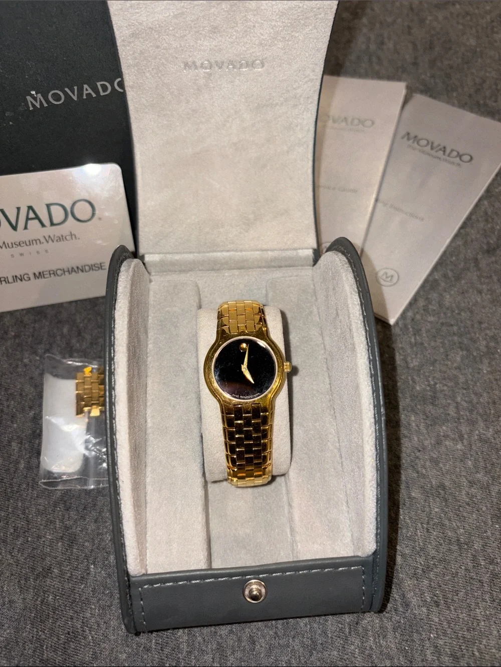 Womens Movado designer watch w grey case & box w logo jewelry watches slim band